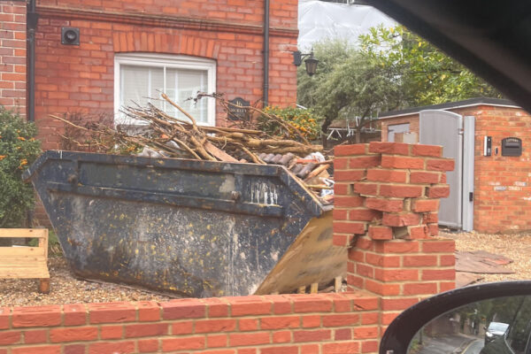 Full skip ready for collection in Tadworth