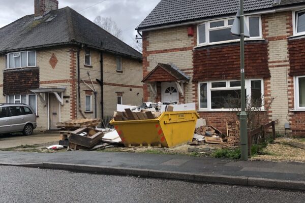 Skip filled with building waste from a home in Birmingham